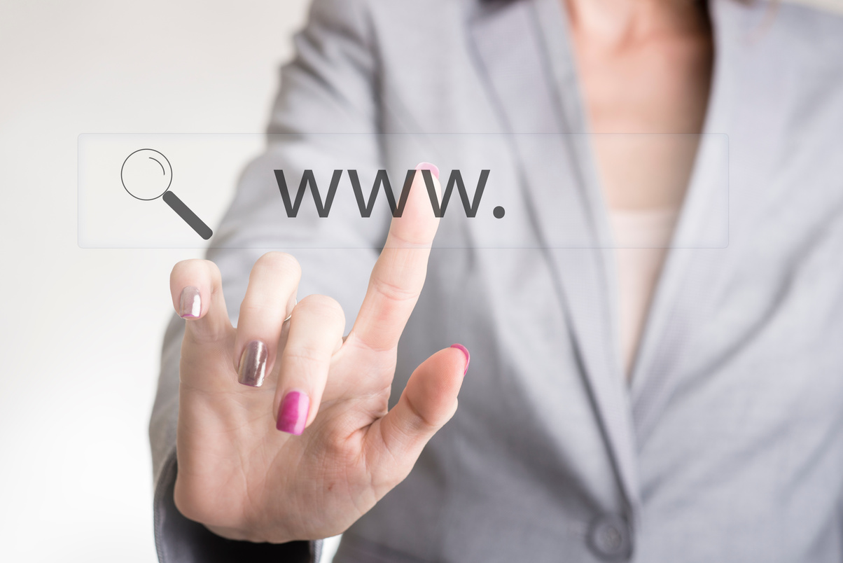 Female Hand Touching a Web Search Bar with Www and Magnifying Gl